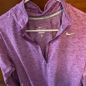 Never worn Nike Purple Dri-Wear quarter zip up.